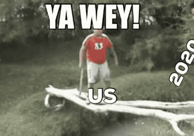Man In Red Shirt Standing On Log Saying Ya Wey Us GIF