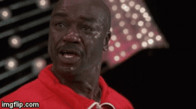 Man In Red Shirt Sweating GIF