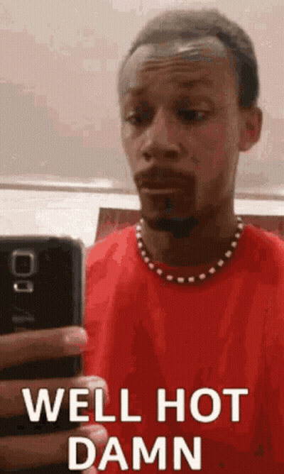 Man In Red Shirt Taking Selfie GIF