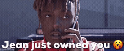 Man In Red Shirt Talking On Phone GIF