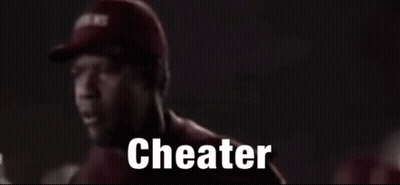 Man In Red Shirt Talking To Man In Red Hat Saying Cheater GIF