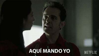 Man In Red Shirt Talking To Woman In Netflix Ad GIF