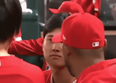 Man In Red Shirt Using Cell Phone GIF