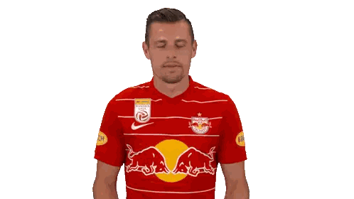 Man In Red Shirt With Bull Sticker