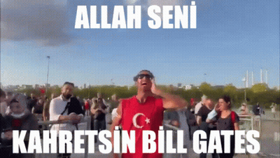 Man In Red Shirt With C Faces Crowd GIF