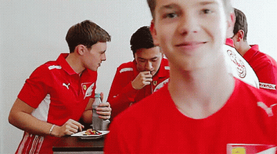 Man In Red Shirt With Ferrari Logo GIF