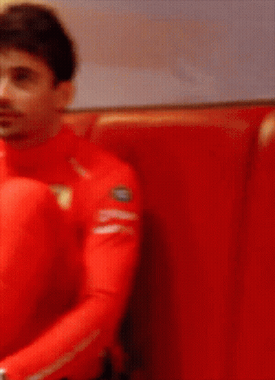 Man In Red Shirt With Ferrari Logo GIF
