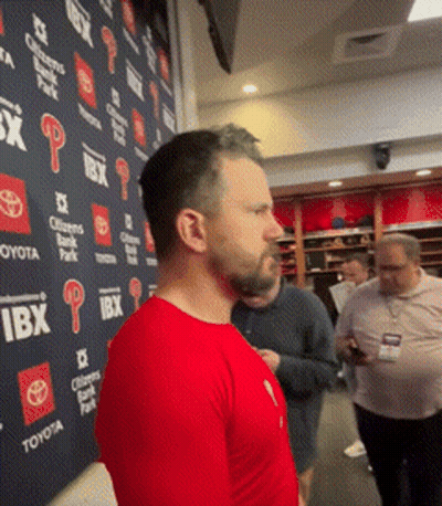 Man In Red Shirt With Ibx Wall GIF
