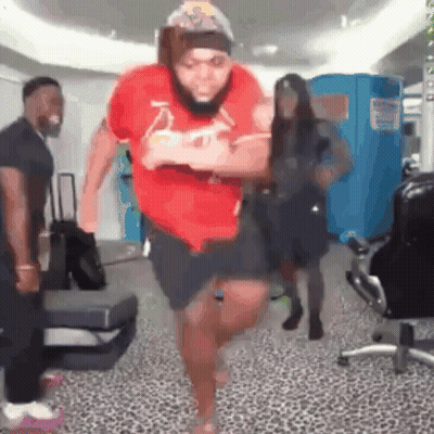 Man In Red Shirt With Letter Z Jumping GIF