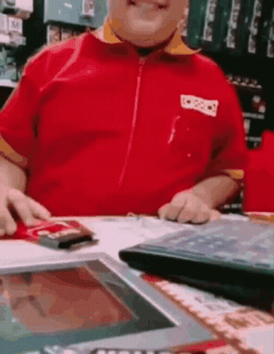 Man In Red Shirt With Nintendo Sticker GIF