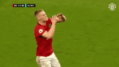 Man In Red Shirt With Number 39 Kneeling GIF