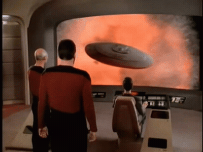 Man In Red Shirt With UFO Screen GIF