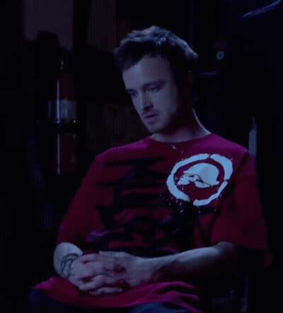 Man In Red Shirt With White Circle GIF