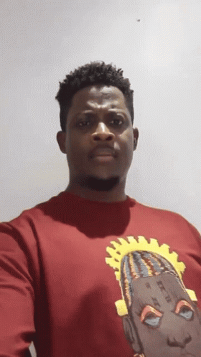 Man In Red Shirt With Woman Face Drawing GIF