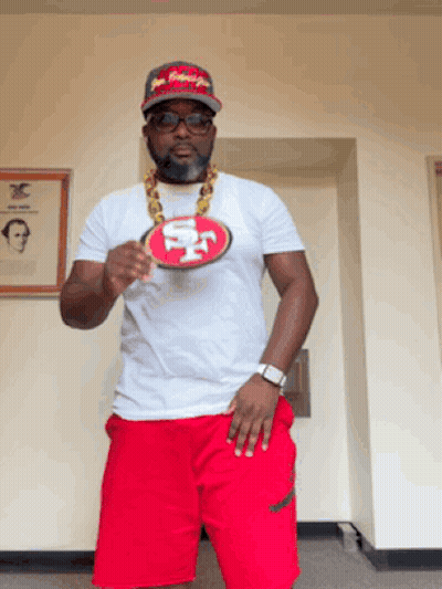 Man In Red Shorts And 49Ers Shirt GIF