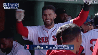 Man In Red Sox Jersey Holding Up Arms GIF