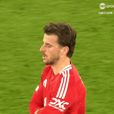 Man In Red Striped Shirt On Soccer Field TNT Sport GIF
