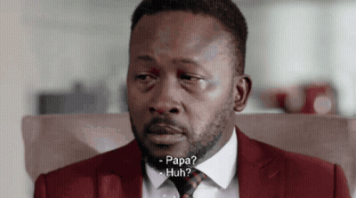 Man In Red Suit And Tie Talking GIF