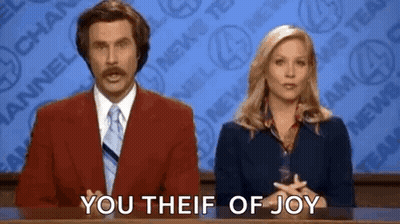 Man In Red Suit Next To Woman In Blue Dress GIF