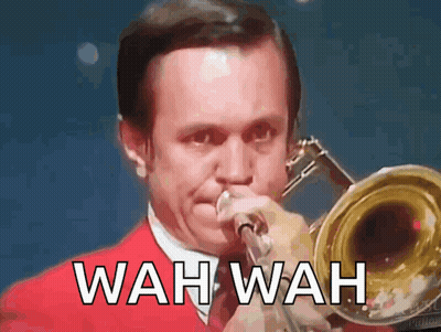 Man In Red Suit Playing Trombone Wah Wah GIF