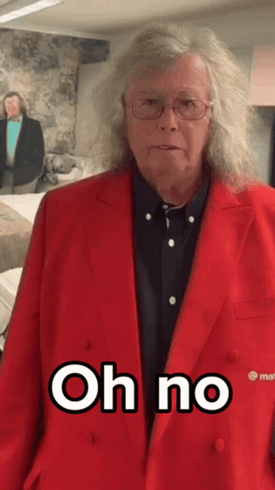 Man In Red Suit Saying Oh No GIF