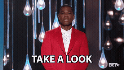 Man In Red Suit Says Take A Look On Stage GIF