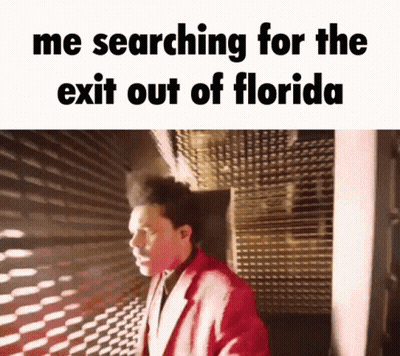 Man In Red Suit Searching For Exit Out Of Florida GIF