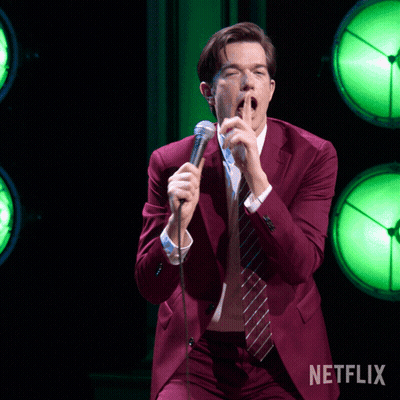 Man In Red Suit Singing Into Microphone Netflix GIF