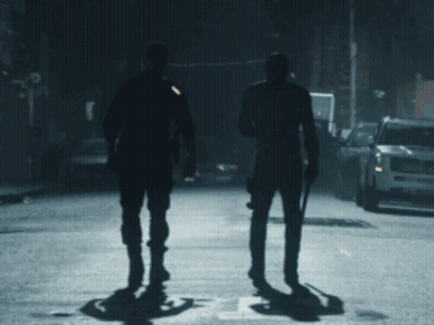 Man In Red Suit Standing Next To Another Man GIF