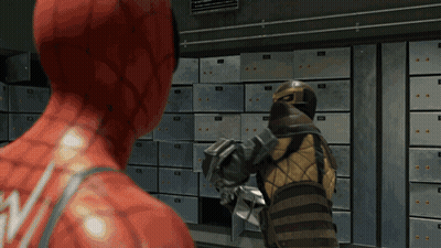 Man In Red Suit Standing Next To Man In Yellow Suit In Front Of Lockers GIF