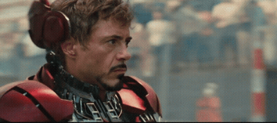 Man In Red Suit With Headphones GIF