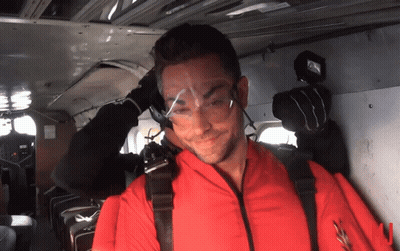 Man In Red Suit With Safety Goggles GIF