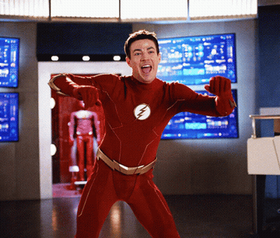Man In Red Superhero Costume With Lightning Bolt GIF