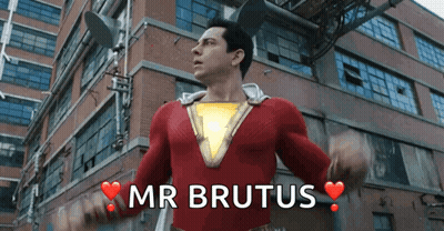 Man In Red Superhero Costume With Mr Brutus Above GIF