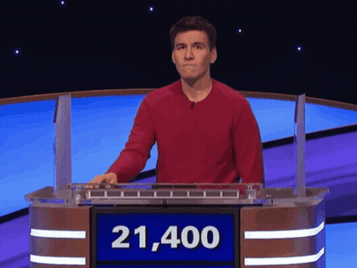 Man In Red Sweater At Podium Saying 21,400 GIF