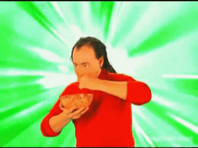Man In Red Sweater Eating Chips GIF