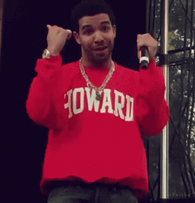 Man In Red Sweater Holding Microphone GIF