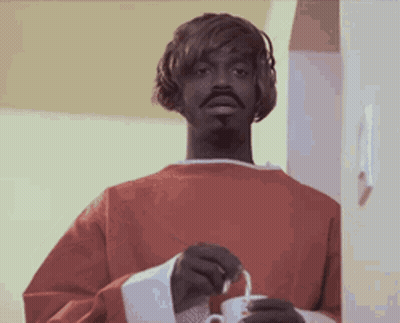 Man In Red Sweater Holding White Cup GIF