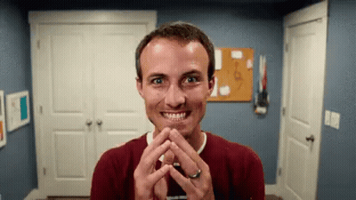 Man In Red Sweater Making Funny Face GIF