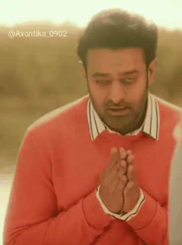 Man In Red Sweater Praying GIF