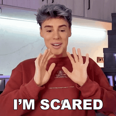 Man In Red Sweater Saying Im Scared GIF