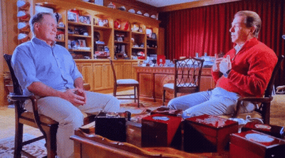 Man In Red Sweater Talking To Another Man GIF