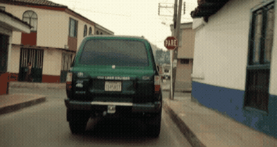 Man In Red Sweater Talking To Man In Black Jacket GIF