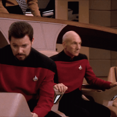 Man In Red Sweater With Star Trek Logo GIF