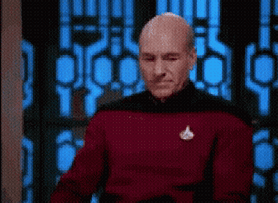 Man In Red Sweater With Star Trek Logo GIF