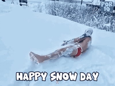 Man In Red Swimsuit Lying In Snow GIF