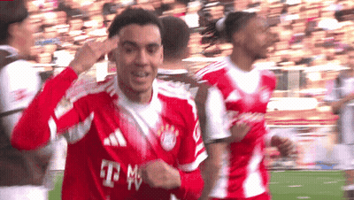 Man In Red T-Mobile Jersey Pointing GIF