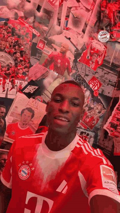 Man In Red T-Mobile Jersey Taking Selfie At Picture Wall GIF