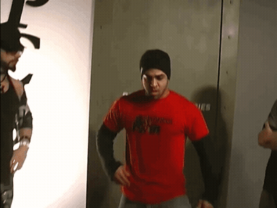 Man In Red T-Shirt With Gorilla Print GIF