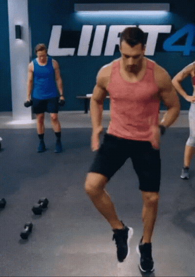 Man In Red Tank Top Jumping Lift 4 GIF